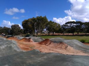 BMX jumps coated with DirtGlue industrial dust suppressant