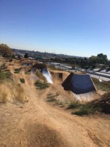 DirtGlue industrial hardens pump track surface