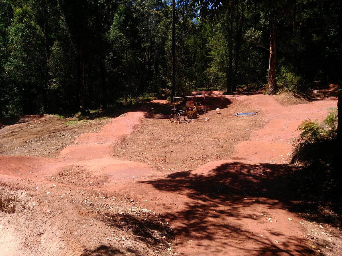 DirtGlue polymer coating for pump Track surfaces